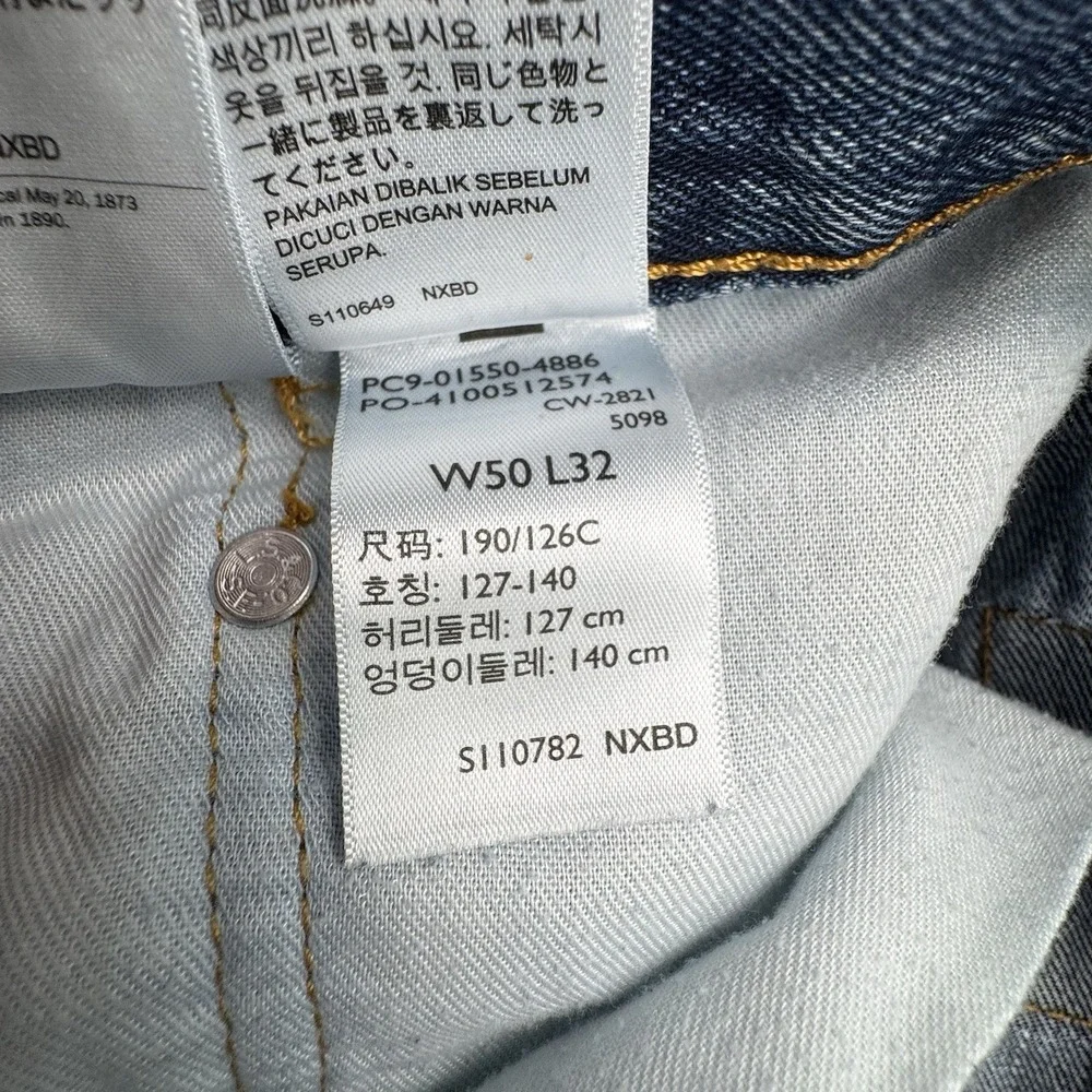 Levis 550 Relaxed Fit Mens Blue Jeans‎ Mens Size 50x32 Fits 50x31 Denim *Hole*